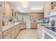 Spacious kitchen with ample cabinetry and countertop space at 36901 Kimela Ave, Zephyrhills, FL 33542