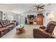 Living room featuring a fireplace and comfortable seating at 36901 Kimela Ave, Zephyrhills, FL 33542