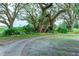 Wind your way through a tree-lined path at 36901 Kimela Ave, Zephyrhills, FL 33542