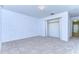 Spacious bedroom with neutral walls and carpet at 37650 Aaralyn Rd, Zephyrhills, FL 33542