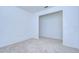 Spacious bedroom with neutral walls and carpet at 37650 Aaralyn Rd, Zephyrhills, FL 33542