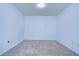 Empty bedroom with neutral carpeting at 37650 Aaralyn Rd, Zephyrhills, FL 33542