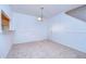 Simple dining room with light walls and carpet at 37650 Aaralyn Rd, Zephyrhills, FL 33542