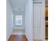 Bright entryway with tile floor and coat closet at 37650 Aaralyn Rd, Zephyrhills, FL 33542