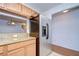 Stainless steel refrigerator in kitchen at 37650 Aaralyn Rd, Zephyrhills, FL 33542