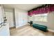 Spacious office with light wood floors and a window seat at 3909 W Eden Roc Cir, Tampa, FL 33634