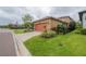 House exterior with red garage door at 5924 Village Center Dr, Lithia, FL 33547