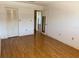 Bright bedroom with wood flooring and closet at 6025 Shore S Blvd # 405, Gulfport, FL 33707