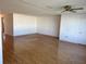 Spacious living room featuring light wood laminate flooring at 6025 Shore S Blvd # 405, Gulfport, FL 33707