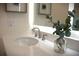 Bright bathroom with a vanity, vessel sink, and illuminated mirror at 7326 12Th N Ave, St Petersburg, FL 33710