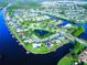 Aerial view of waterfront community with luxury homes at 8610 Quinn Ct, North Port, FL 34287