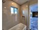 Updated bathroom with neutral tile and a tub/shower combo at 8610 Quinn Ct, North Port, FL 34287