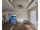 Spacious living room with hardwood floors and ceiling fan at 8610 Quinn Ct, North Port, FL 34287