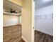 Large walk-in closet with wood-look floors at 8610 Quinn Ct, North Port, FL 34287