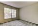 Spacious bedroom with large window and ample closet space at 8727 Huntfield St, Tampa, FL 33635