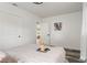 Bright bedroom with a cozy bed and wood-look floors at 936 Lyndhurst St, Dunedin, FL 34698