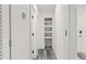 Bright hallway with built-in shelving and modern flooring at 936 Lyndhurst St, Dunedin, FL 34698