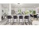 Open concept kitchen with a large island and modern cabinetry at 936 Lyndhurst St, Dunedin, FL 34698