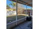 Relaxing screened porch overlooking backyard at 10808 Peppersong Dr, Riverview, FL 33578