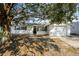 Charming single story home with a spacious front yard and attached garage at 1172 Fernwood Dr, Holiday, FL 34690
