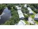 Aerial view of community with lake and lush landscaping at 11847 Skylake Pl # D, Tampa, FL 33617