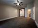 Spacious bedroom with carpet flooring and ensuite bathroom at 11847 Skylake Pl # D, Tampa, FL 33617