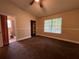 Bedroom with carpet flooring, ceiling fan and ensuite bathroom at 11847 Skylake Pl # D, Tampa, FL 33617