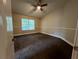 Bright bedroom with carpet flooring and ceiling fan at 11847 Skylake Pl # D, Tampa, FL 33617