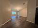 Bright dining room with laminate flooring and chandelier at 11847 Skylake Pl # D, Tampa, FL 33617