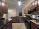Kitchen with granite countertops and stainless steel appliances at 11847 Skylake Pl # D, Tampa, FL 33617