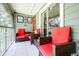 Relaxing screened lanai with comfortable wicker furniture at 11847 Skylake Pl # D, Tampa, FL 33617