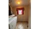 Small laundry room with washer, dryer, and window at 11847 Skylake Pl # D, Tampa, FL 33617