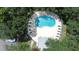 Community pool with plenty of lounge chairs for sunbathing at 11847 Skylake Pl # D, Tampa, FL 33617