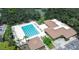 Aerial view of community pool and tennis courts at 11847 Skylake Pl # D, Tampa, FL 33617