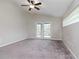 Bedroom featuring French doors leading to a patio, and ceiling fan at 13012 Creek Manor Ct, Riverview, FL 33569