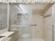 Shower stall with glass enclosure and shelves at 13215 Slash Pine Dr # H, Hudson, FL 34669