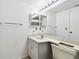 Bathroom with gray vanity, single sink and shower/tub combo at 13215 Slash Pine Dr # H, Hudson, FL 34669