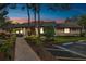 Well-maintained community building with landscaping and parking at 13215 Slash Pine Dr # H, Hudson, FL 34669