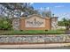 Community entrance sign for Pine Ridge at Sugar Creek at 13215 Slash Pine Dr # H, Hudson, FL 34669