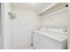 Laundry room with washer and dryer included at 13215 Slash Pine Dr # H, Hudson, FL 34669