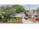 House with driveway and landscaping, viewed from above at 1635 Omaha St, Palm Harbor, FL 34683