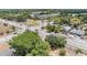 Aerial view of property and surrounding area, near a school at 1635 Omaha St, Palm Harbor, FL 34683