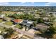 Aerial view of a residential neighborhood with houses and waterways at 177 Dowling Ne Ave, Port Charlotte, FL 33952
