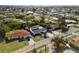 Aerial view showing a home's location in a neighborhood near the water at 177 Dowling Ne Ave, Port Charlotte, FL 33952