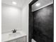 Modern bathroom with walk-in shower and white vanity at 177 Dowling Ne Ave, Port Charlotte, FL 33952