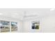 Bright bedroom with ceiling fan and multiple windows at 177 Dowling Ne Ave, Port Charlotte, FL 33952