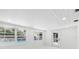 Bright bonus room with white walls and marble floors at 177 Dowling Ne Ave, Port Charlotte, FL 33952