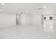 Bright hallway with white walls and marble floors at 177 Dowling Ne Ave, Port Charlotte, FL 33952