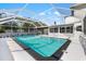 Inviting pool area with a screened enclosure at 177 Dowling Ne Ave, Port Charlotte, FL 33952