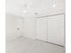 Bright bedroom with double closets and luxury vinyl plank flooring at 18434 Goodman Cir, Port Charlotte, FL 33948